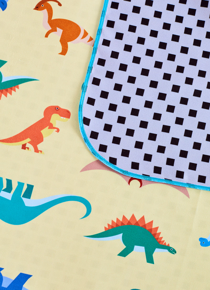 detail of dinosaurs pattern illustration, towel for kids made in Spain